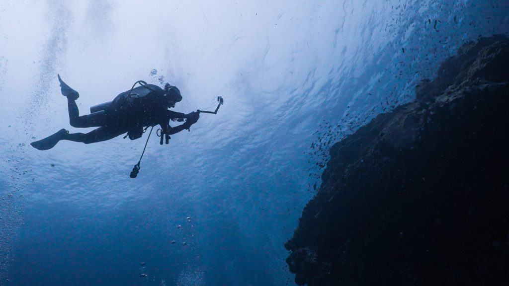 Sithonia diving. Underwater diver at Halkidiki near reef